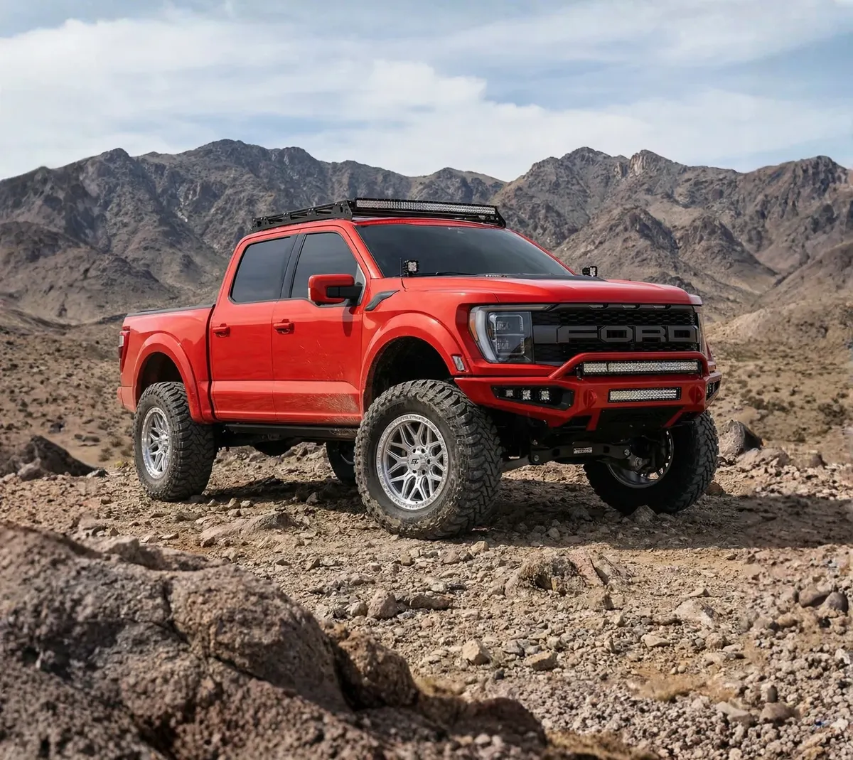 Lifted Ford F-150 on GT Off-Road Revolt wheels in Silver Machined